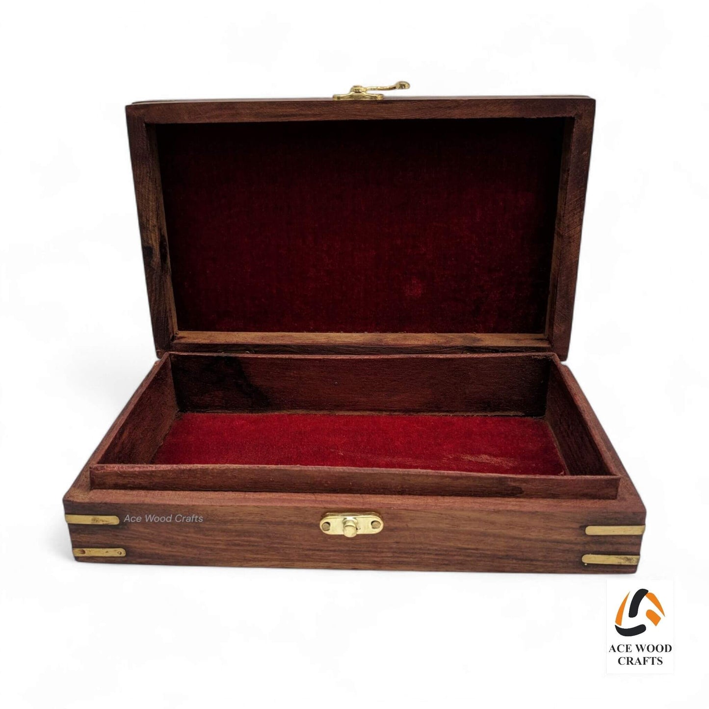 Closed view of the keepsake box showing the contrast between smooth inlay and deep carving.