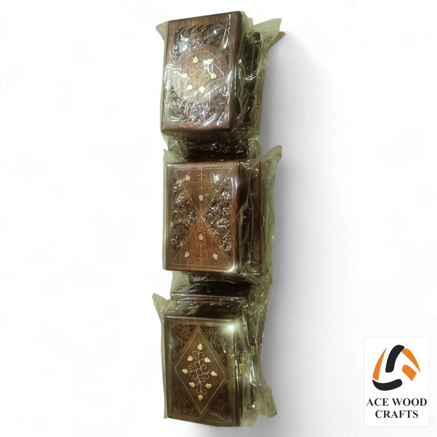 Set of 3 nesting wooden boxes stacked and ready for export, showing high-quality wood grain.