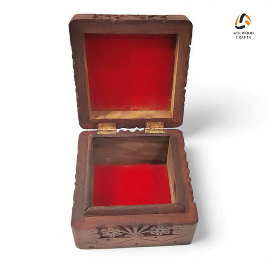 Angled view of handcrafted Sheesham wood keepsake box with diagonal brass inlay.