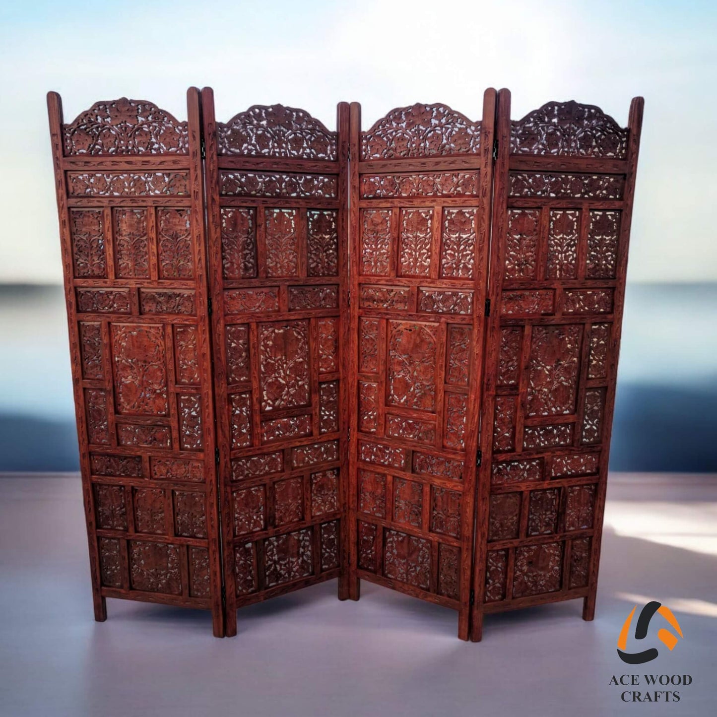 Wooden screen with intricate hand carving placed in a home made by 'Ace Wood Crafts'.