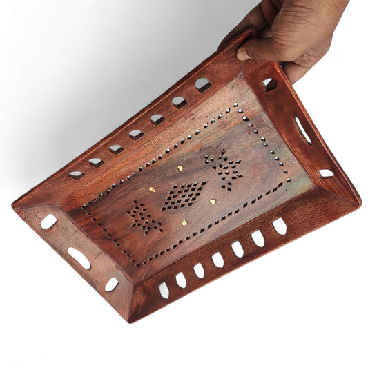 Front view of polished Sheesham wood rectangular serving tray with cutout handles.