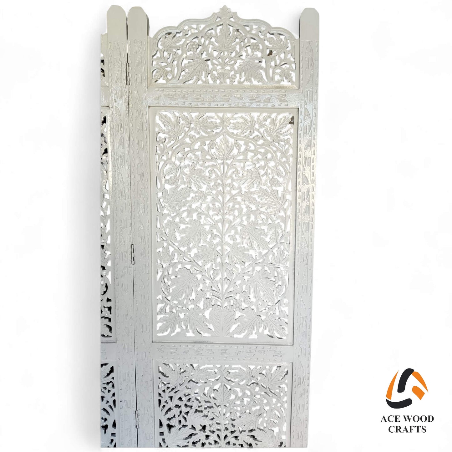 Close up detail of intricate floral carving on white distressed wood partition