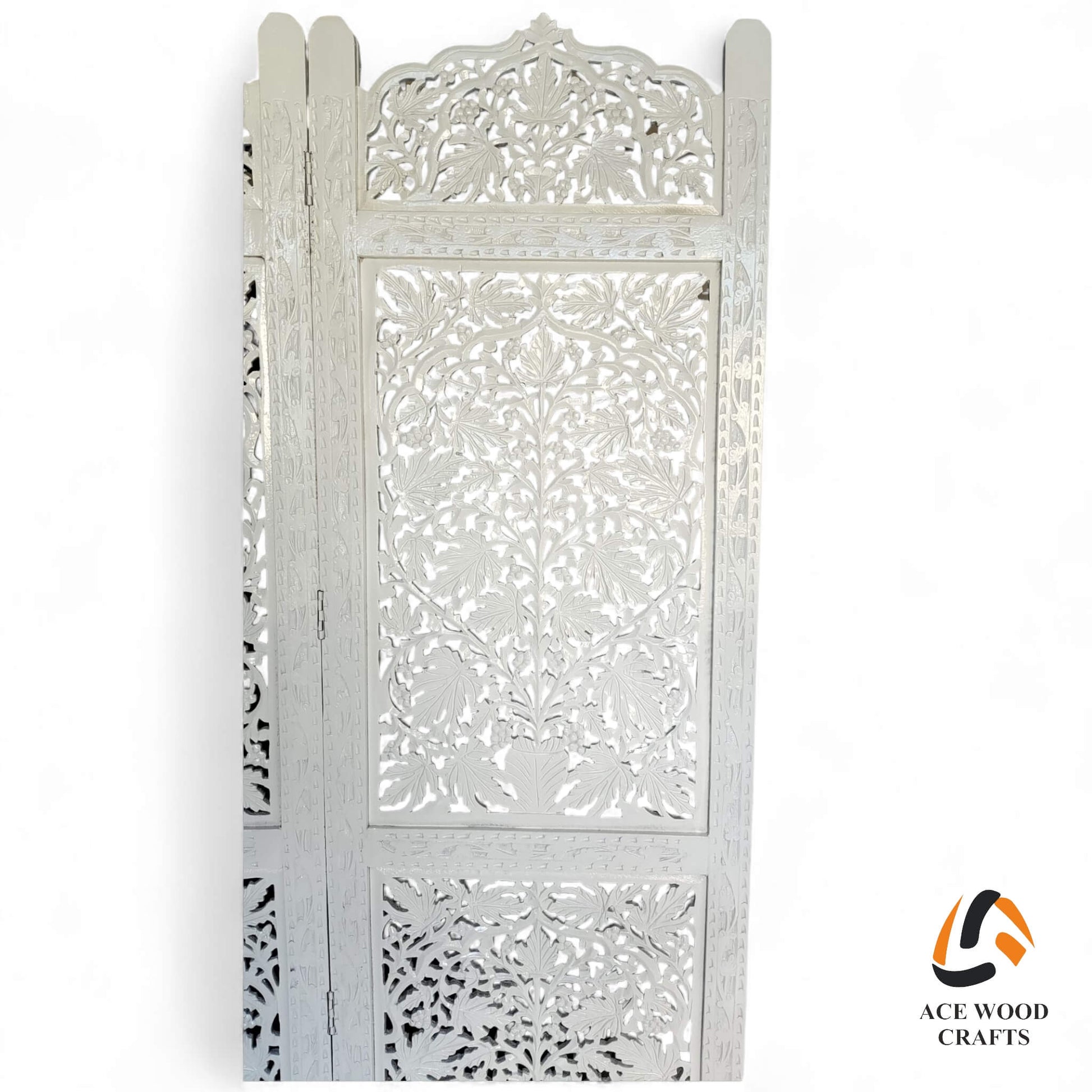 Close up detail of intricate floral carving on white distressed wood partition