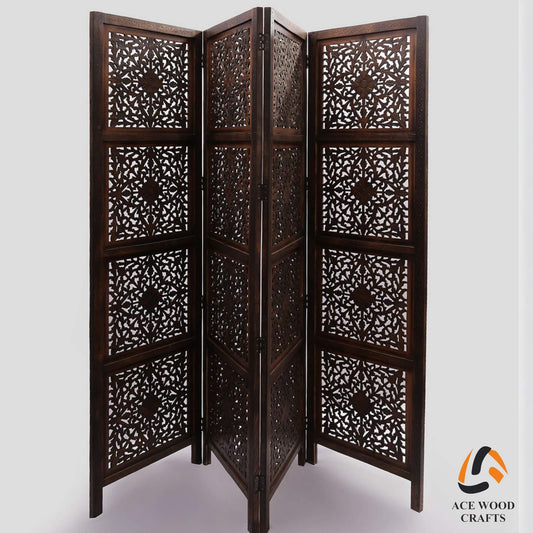 Front view of handcrafted 4-panel mango wood room divider with geometric star carvings.