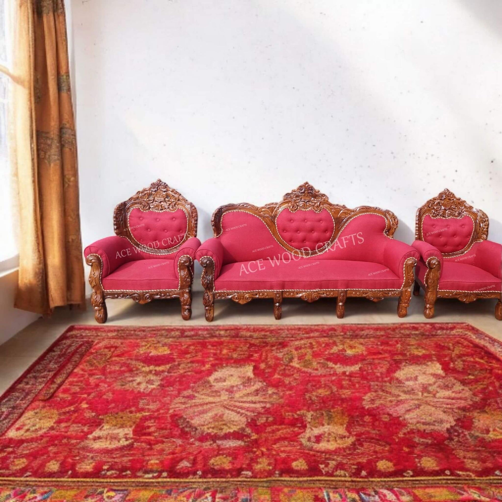 Full living room setup of the royal red sofa set placed on a red carpet.