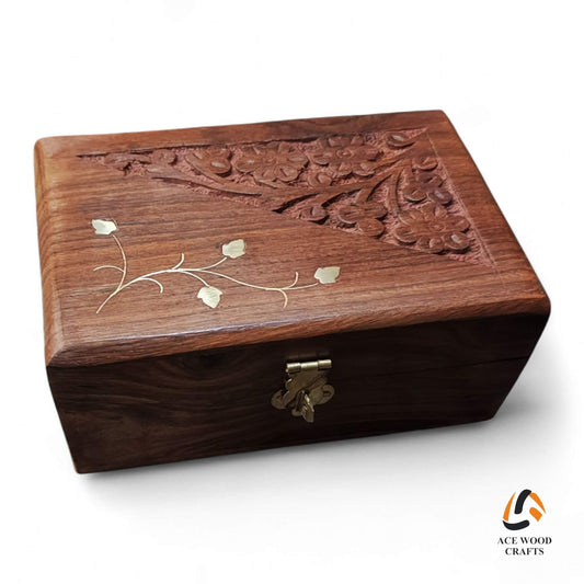 ngled view of hand-carved Sheesham wood jewellery box with floral brass inlay.