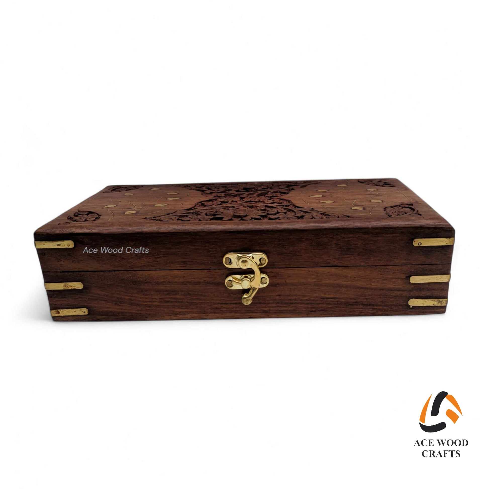 Top view of wooden jewellery box featuring a twin crescent brass inlay and floral carving.