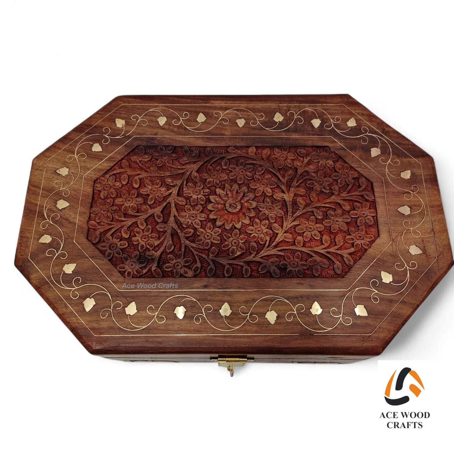 Closed view of Sheesham wood jewellery box with intricate brass leaf inlay on the lid.