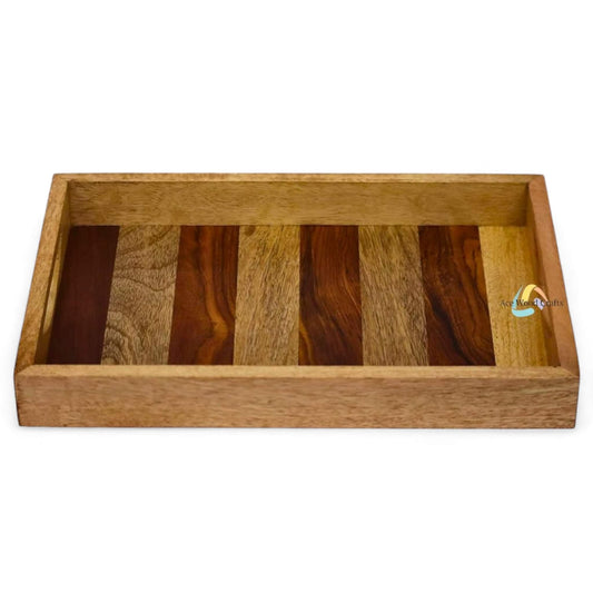 Angled view of rustic wooden serving tray with natural bark edge and carved cutout handles.