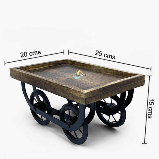 Angled view of rustic wooden serving tray with natural bark edge and carved cutout handles.
