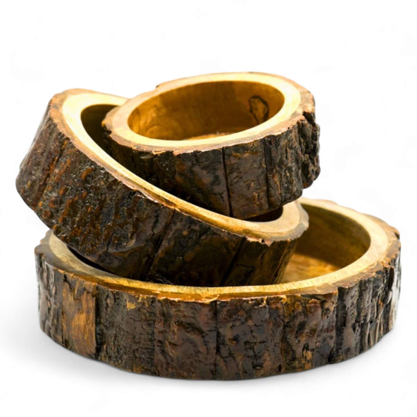Stack of three rustic wooden round bowls with natural bark edges.
